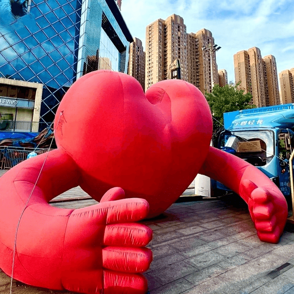 Giant Hugging Inflatable Heart Prop for Events and Displays
